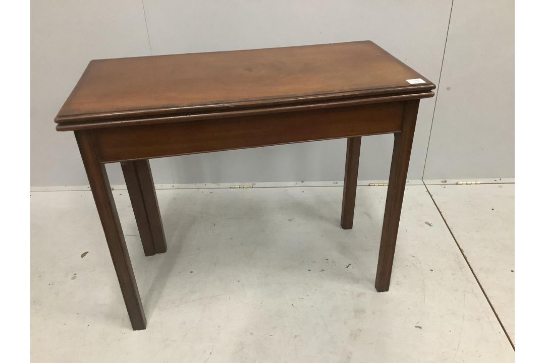 A George III rectangular banded mahogany folding card table, width 91cm, depth 45cm, height 76cm. - Image 1 of 2
