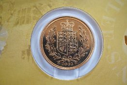 British gold coins, QEII Royal Mint UK 2002 bullion sovereign, BUNC, carded