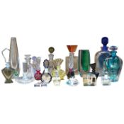 Eighteen glass scent bottles, two silver mounted, tallest 24.5cm, and a glass vase. Condition -