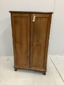 An early 20th century walnut office cabinet fitted with nine deep drawers, width 61cm, height 106cm.