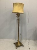 An Edwardian brass telescopic lamp standard, converted to electricity, height 180cm including shade.