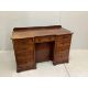 A Victorian mahogany kneehole desk, fitted nine small drawers, width 125cm, height 78cm. Condition - - Image 1 of 3