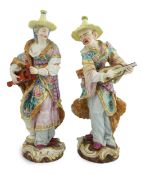 A pair of Meissen Malabar Musicians, 19th century, after the models by F.E. Meyer, both wearing