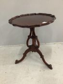 A George III style mahogany tripod wine table, by Henderson, diameter 50cm, height 60cm. Condition -