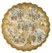 A Japanese Satsuma chrysanthemum petal lobed dish, Meiji period, painted to fan and leaf shaped