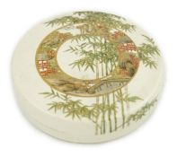 A Japanese Satsuma circular box and cover, early 20th century, painted with a disc shaped