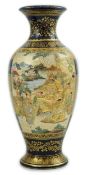 A Japanese Satsuma blue ground ovoid vase, Meiji period, painted with courtesans in a landscape, the