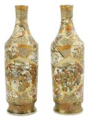 A pair of Japanese Satsuma bottle vases, Meiji period, painted with shaped reserves of bijin,