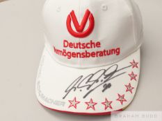 Michael Schumacher signed Deutsche Vermogensberatung white cap,