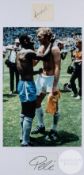 Bobby Moore and Pele double-signed 1970 World Cup shirt swap framed photographic display,