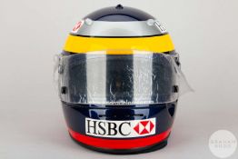 An Arai exclusive blue, yellow and red replica 2001 Pedro De La Rossa FIA Jaguar Team racing helmet.
