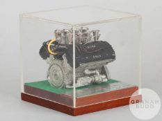 A 1977 presentation model of a Ford Cosworth Formula 1 engine by Keith Duckworth.