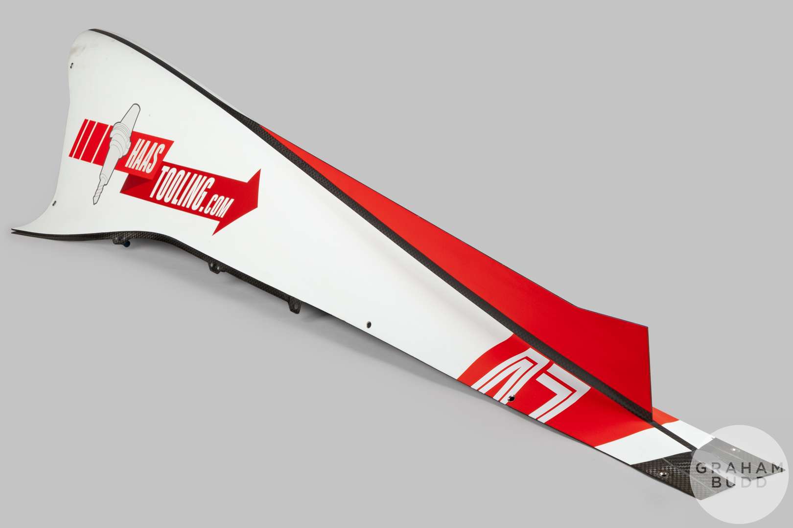 An official Haas F1 2022 engine cover with HaasTooling.com decal.