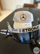 Valtteri Bottas Mercedes F1 memorabilia, race used visor with Finnish flag.