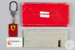 Rare continental silver and enamel Ferrari 2002 world championship commemorative keyring.