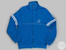 Ayrton Senna blue autographed Sergio Tacchini track suit top.