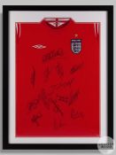A red Umbro England shirt