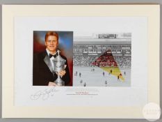A large colour print of David Beckham with the Young Player of the Year trophy for 1997