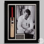 A large black and white photographic print of Sir Ian Botham
