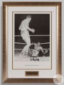 A large black and white photographic print of Sir Henry Cooper