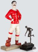 Two footballing figurines