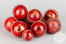 A collection of eight assorted cricket balls