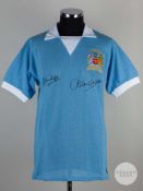 A sky blue replica Manchester City short sleeved 1970's Airtex home shirt.