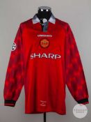 Eric Cantona red & white No.7 Manchester United match worn long-sleeved shirt, 1996-97