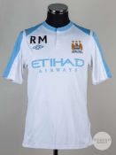 Roberto Mancini white and blue worn training top, 2010-11.