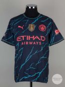John Stones navy blue No.5 Manchester City short-sleeved shirt, 2023-24.