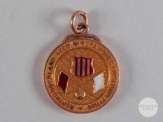 Tom Curry 9ct gold & enamel Northumberland Aged Miners Homes Cup winners medal, 1926-27.