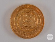 Jack Lambert an Arsenal 15ct gold Football Association Charity Shield medal.