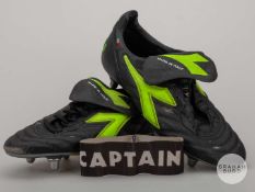 Roy Keane pair of black and yellow Diadora match worn football boots, c.2000.