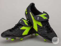 Gary Neville pair of black & yellow Diadora match worn football boots, c.2002.