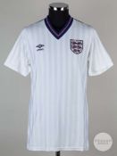 Viv Anderson white No.12 England match issued short-sleeved shirt, 1986