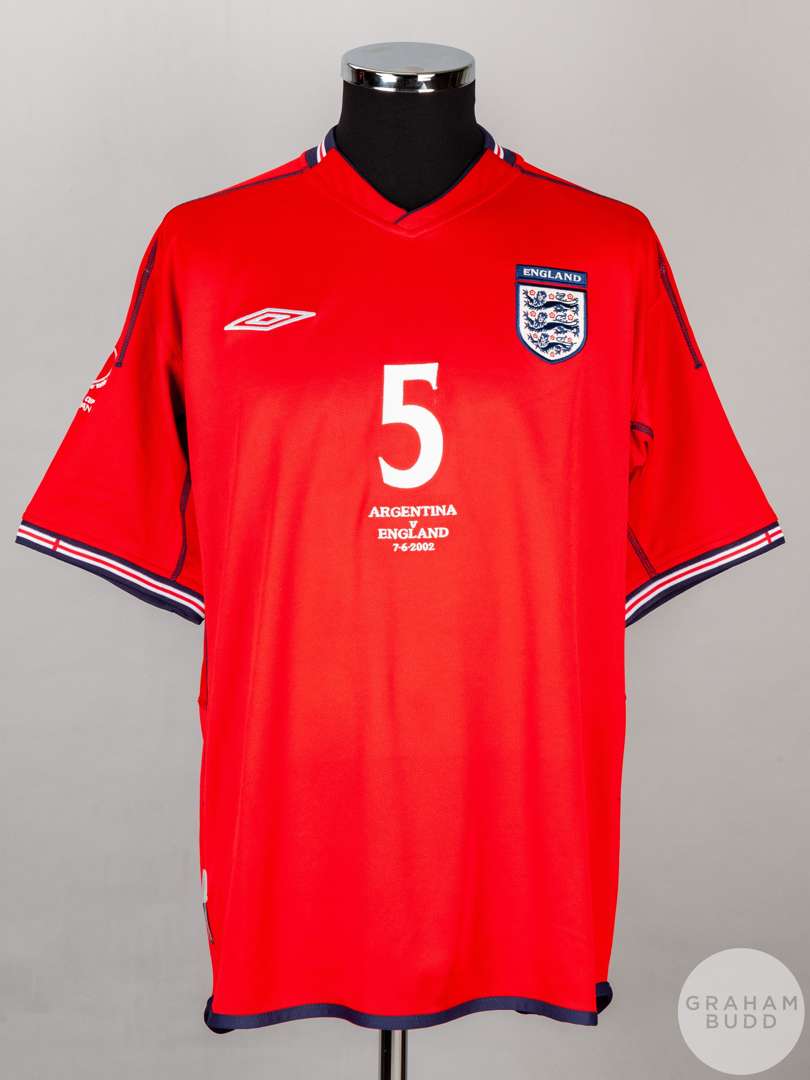 Rio Ferdinand red No.5 England short sleeved 2002 shirt.