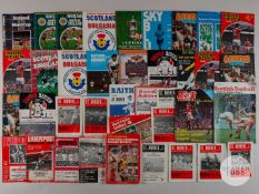 Gordon McQueen a collection of thirty International and domestic match programmes