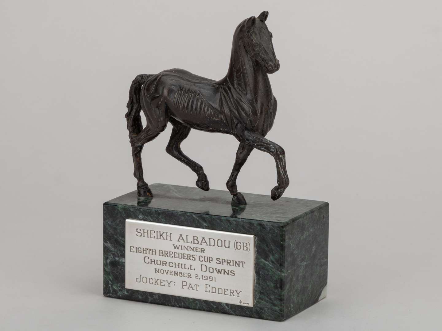 Winning jockey's trophy awarded to Pat Eddery for victory on Sheikh Albadou, Breeders' Cup Sprint.