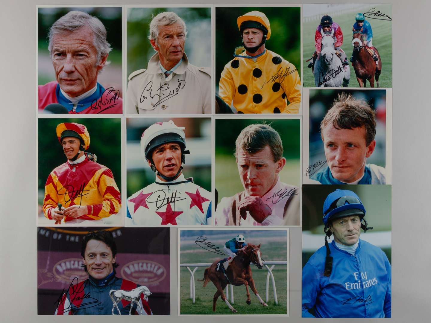 11 signed photographs of leading flat race jockeys.