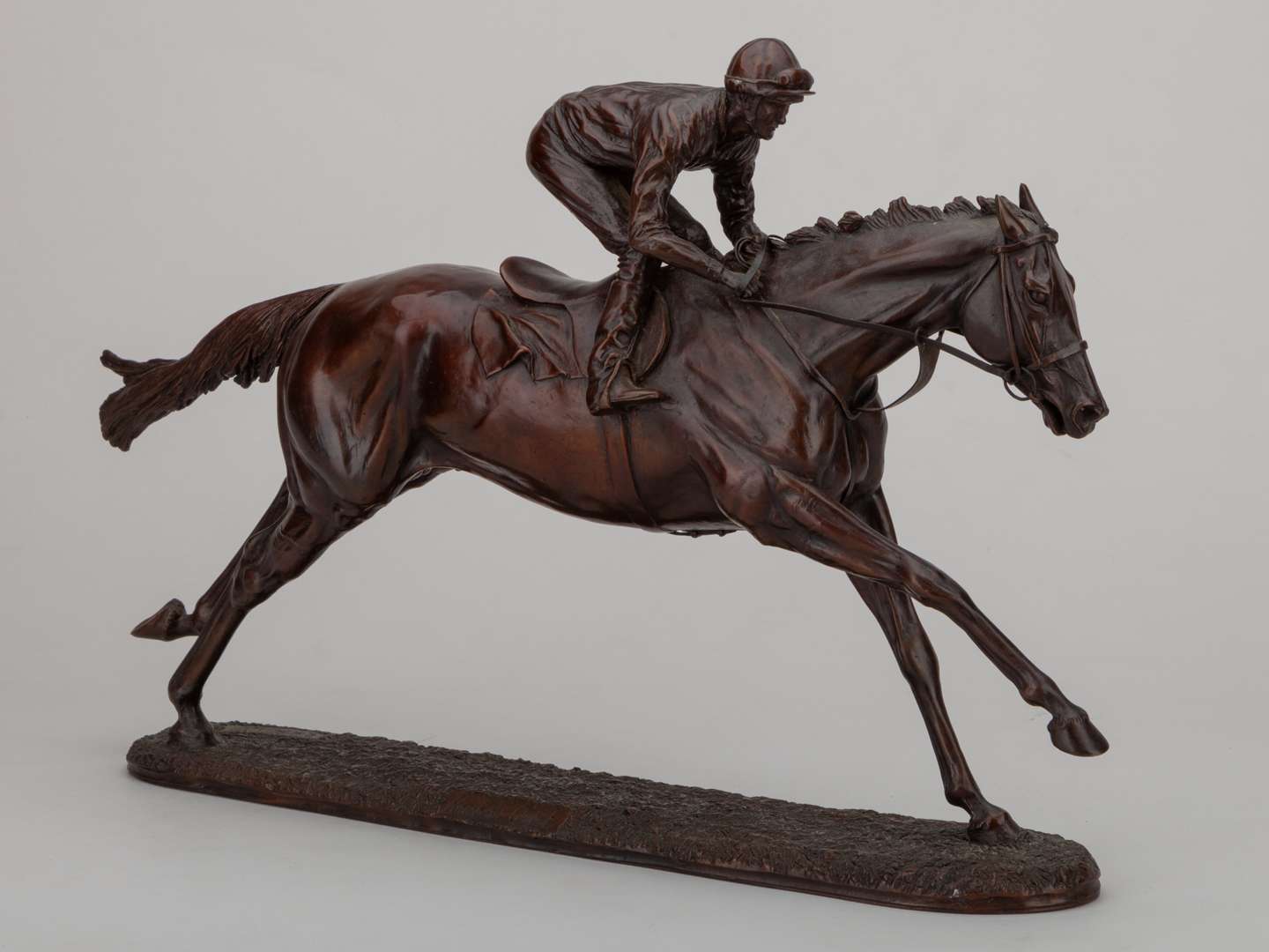A bronze by Gill Parker of the racehorse Rainbow Quest with jockey Pat Eddery up.