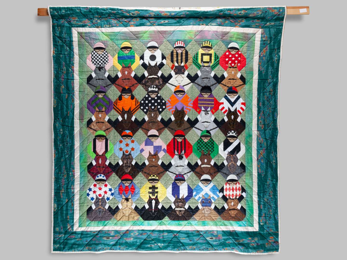 A superb horse racing quilt by the artist Brenda Martin Matthews.
