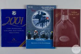 Three racecards each fully-signed by the competing jockeys.
