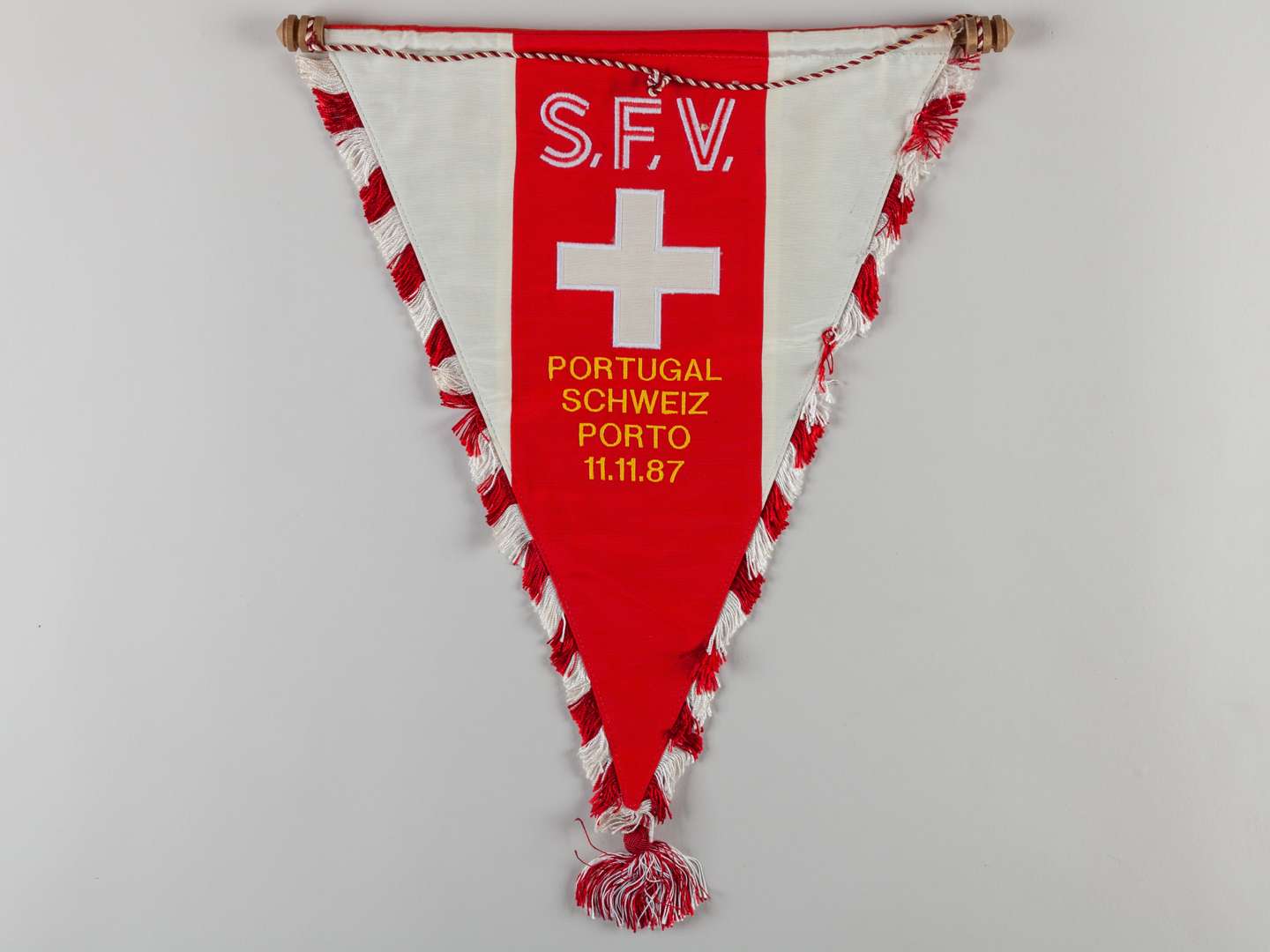 A red and white Switzerland v. Portugal official pennant, 1987