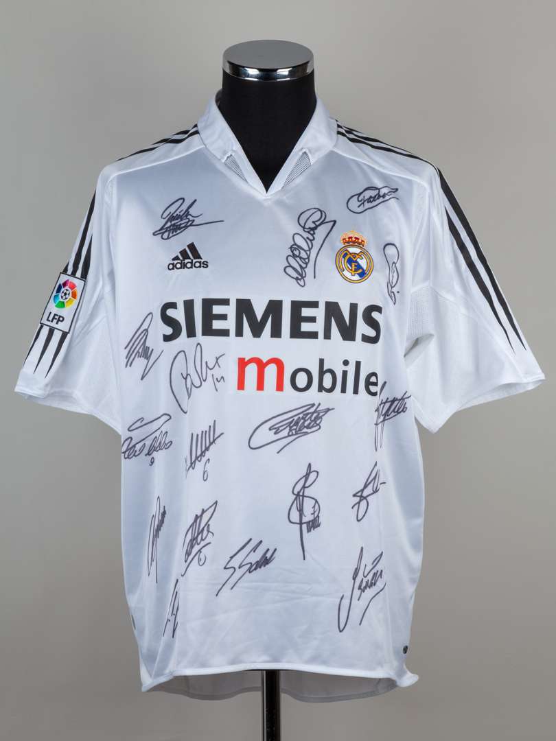 A white Real Madrid autographed shirt