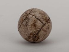 An early feather-filled golf ball.