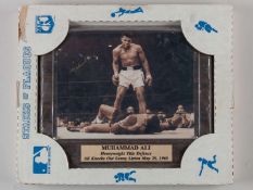 A signed Muhammad Ali plaque.