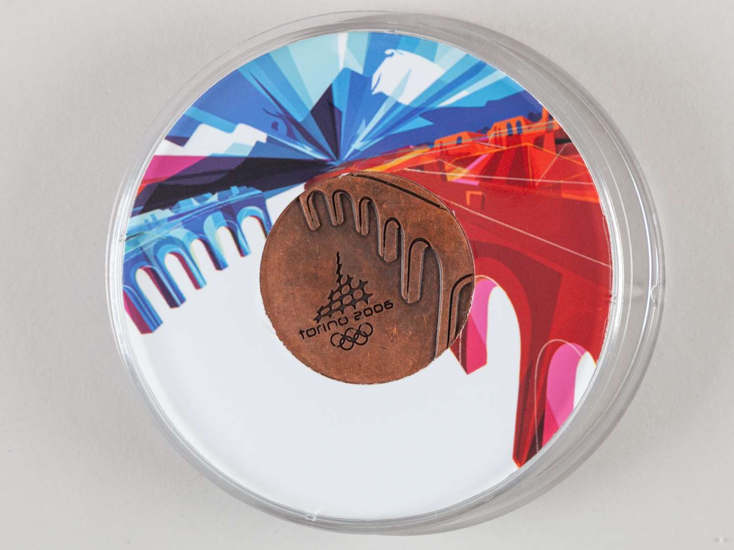 Torino 2006 Winter Olympic Games participant's medal.