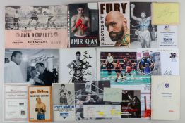 A collection of various boxing autographs including Henry Cooper.