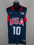 A Kobe Bryant signed USA basketball shirt.