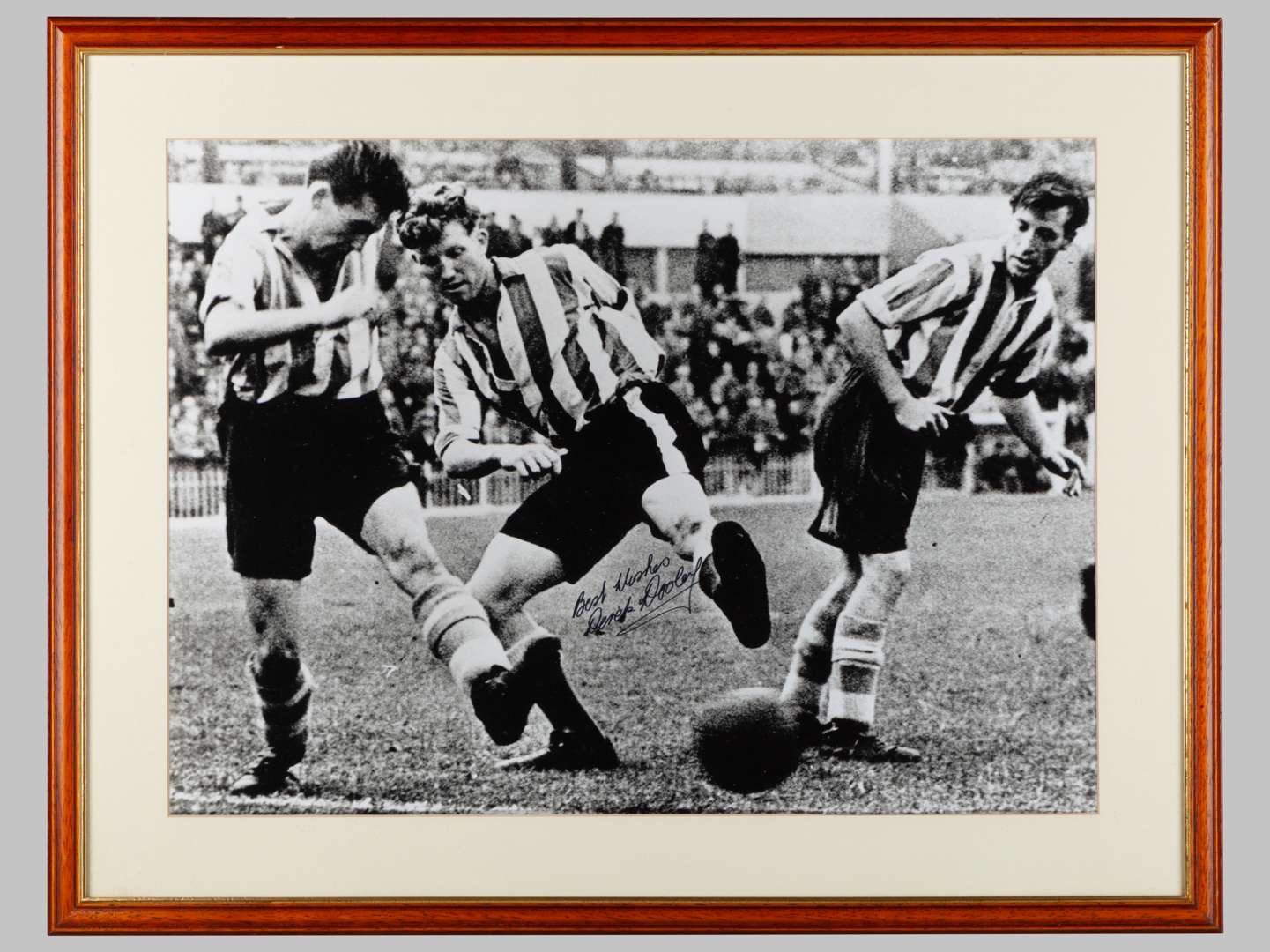 A large black & white photographic print of Sheffield Football legend Derek Dooley.